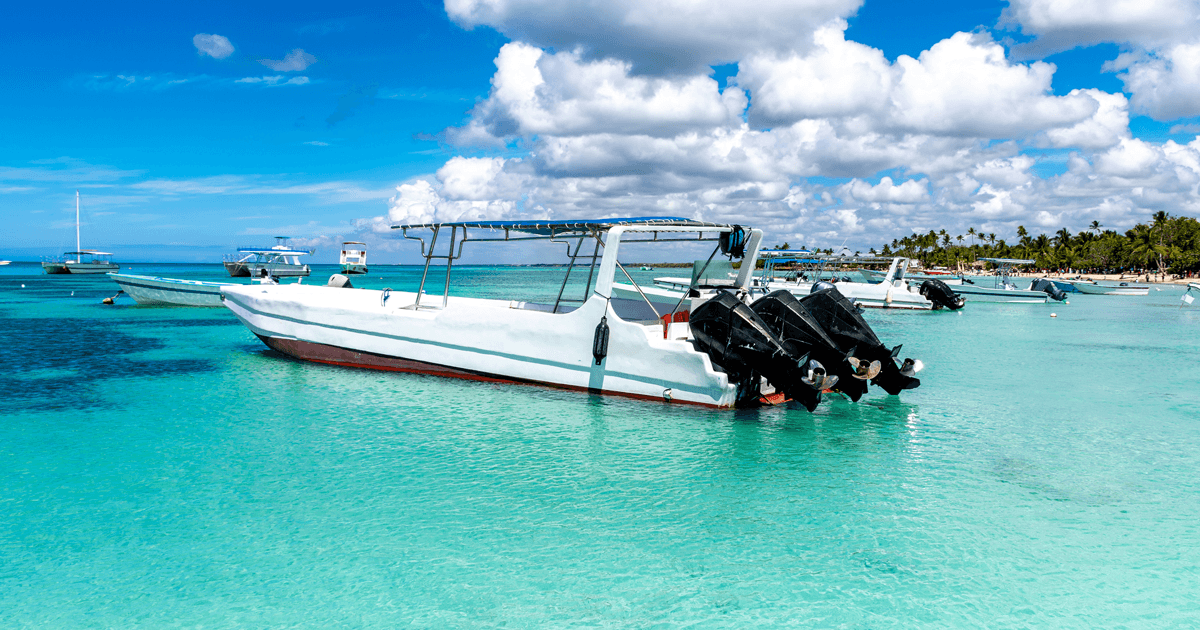 Three motors with propellers being repaired on a dock